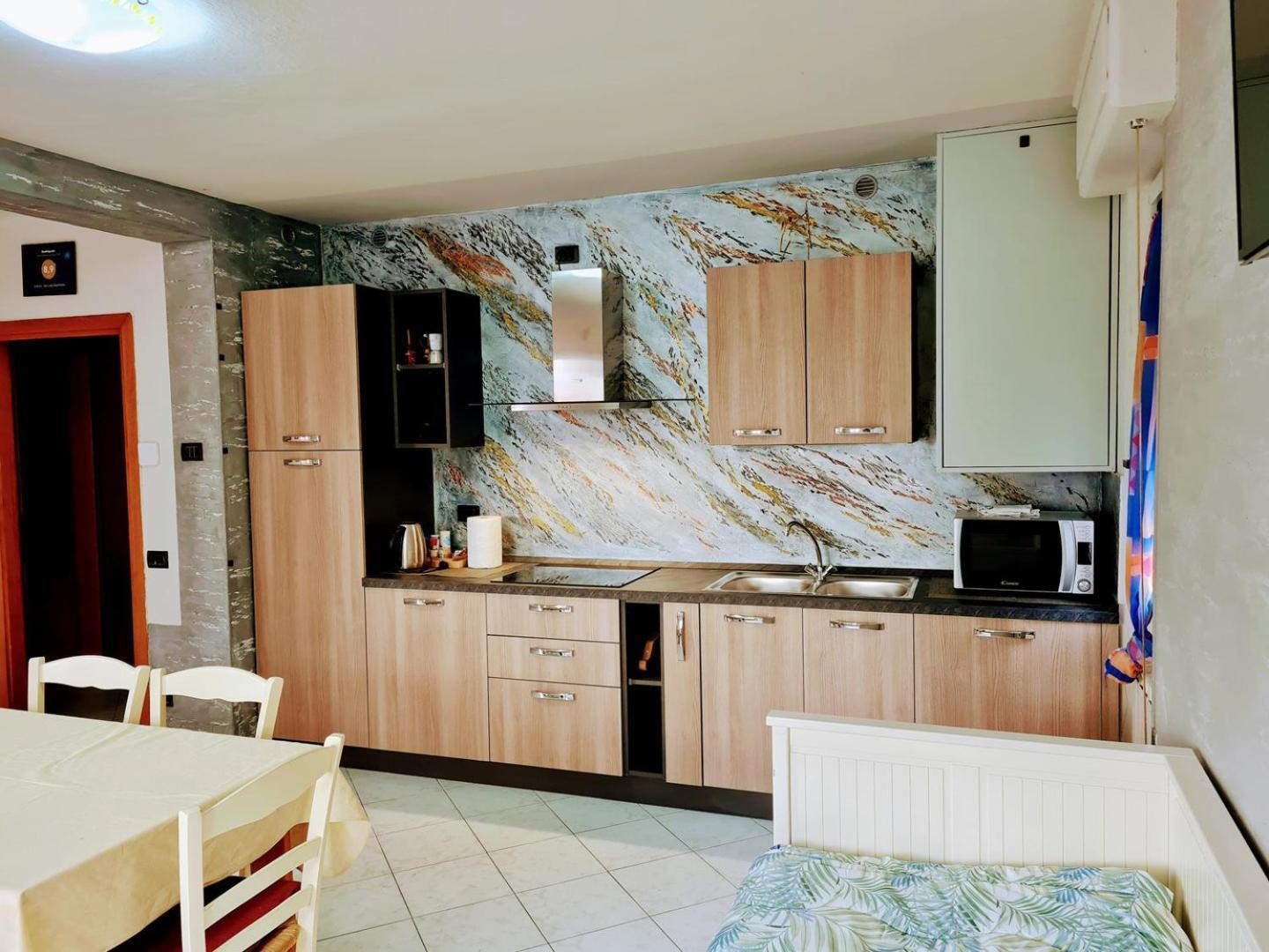 Kidonia - Iseo Lake Apartmens Sale Marasino Bagian luar foto